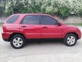 Red Kia Sportage 2010 for sale in Talisay-6