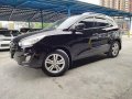 Selling Black Hyundai Tucson 2012 Automatic Gasoline at 57000 km-1