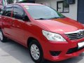 Red Toyota Innova 2013 at 83000 km for sale -0