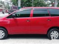 Red Toyota Innova 2013 at 83000 km for sale -7