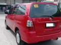 Red Toyota Innova 2013 at 83000 km for sale -5