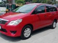 Red Toyota Innova 2013 at 83000 km for sale -2