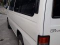 Selling White Nissan Urvan 2015 at 124000 km-0