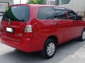 Red Toyota Innova 2013 at 83000 km for sale -3