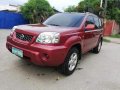 Selling Red Nissan X-Trail 2005 Automatic Gasoline -8
