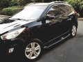 Black Hyundai Tucson 2011 at 37000 km for sale -3