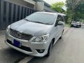 Silver Toyota Innova 2012 at 95000 km for sale -2