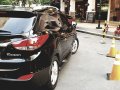 Black Hyundai Tucson 2011 at 37000 km for sale -6