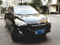Black Hyundai Tucson 2011 at 37000 km for sale -1