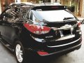 Black Hyundai Tucson 2011 at 37000 km for sale -4