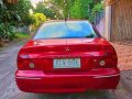 Selling Red Mitsubishi Lancer 2003 at 100000 km -4