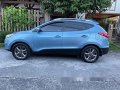 Selling Blue Hyundai Tucson 2014 at 100000 km-4