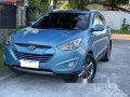 Selling Blue Hyundai Tucson 2014 at 100000 km-11