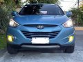 Selling Blue Hyundai Tucson 2014 at 100000 km-7