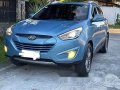 Selling Blue Hyundai Tucson 2014 at 100000 km-8