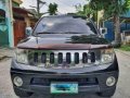 Sell Black 2010 Nissan Frontier navara in Manila-8