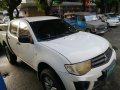 Selling White Mitsubishi Strada 2013 Manual Diesel at 55000 km-3