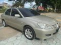 Sell Beige 2007 Mitsubishi Lancer in Talisay-1