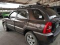 Brown Kia Sportage 2009 for sale in Cainta -3