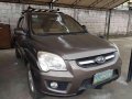 Brown Kia Sportage 2009 for sale in Cainta -7