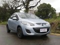 Blue Mazda 2 2014 for sale in Quezon City-1