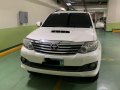Pearl White Toyota Fortuner 2013 for sale in Makati-9