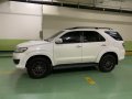 Pearl White Toyota Fortuner 2013 for sale in Makati-8