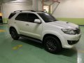 Pearl White Toyota Fortuner 2013 for sale in Makati-7