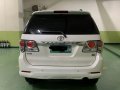 Pearl White Toyota Fortuner 2013 for sale in Makati-6