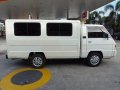 Selling White Mitsubishi L300 2014 in Quezon City-10