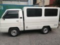 Selling White Mitsubishi L300 2013 in Quezon City-0