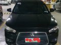 Selling Black Mitsubishi Lancer 2012 in Caloocan-9