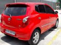 Red Toyota Wigo 2016 for sale in Quezon City -4
