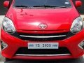 Red Toyota Wigo 2016 for sale in Quezon City -0