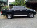 Black Toyota Hilux 2014 for sale in Quezon City -3