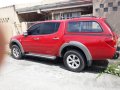 Red Mitsubishi Strada 2010 for sale in Parañaque-6