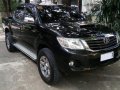 Black Toyota Hilux 2014 for sale in Quezon City -10