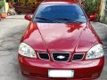 Red Chevrolet Optra 2004 for sale in Manual-9