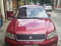 Selling Mitsubishi Lancer 2003 in Quezon City -1