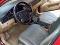 Red Chevrolet Optra 2004 for sale in Manual-0
