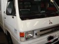 White Mitsubishi L300 2014 for sale in Quezon City-6