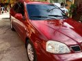 Red Chevrolet Optra 2004 for sale in Manual-7