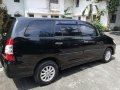 Black Toyota Innova 2012 for sale in Manual-2