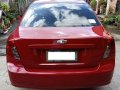 Red Chevrolet Optra 2004 for sale in Manual-6