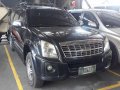 Selling Black Isuzu Alterra 2013 in Quezon City-0