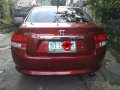 Red Honda City 2009 at 97000 km for sale -3