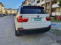 White Bmw X5 2009 at 61000 km for sale -1