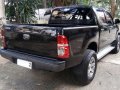 Black Toyota Hilux 2014 for sale in Quezon City -6