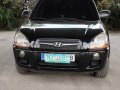 Selling Black Hyundai Tucson 2009 at 92000 km-0