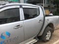 Selling Silver Mitsubishi Strada 2007 at 98000 km-0